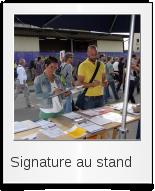 Signature au stand